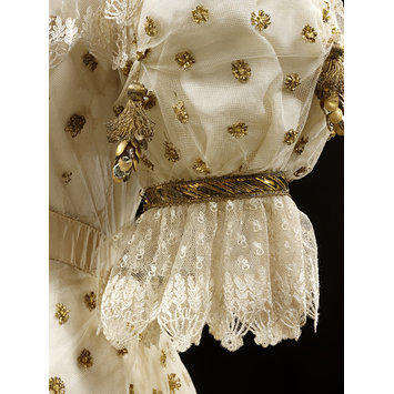 Blonde lace detail from a gown from the V & A Museum collection
